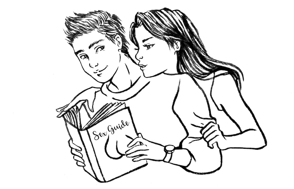 woman and man reading a sex tips book