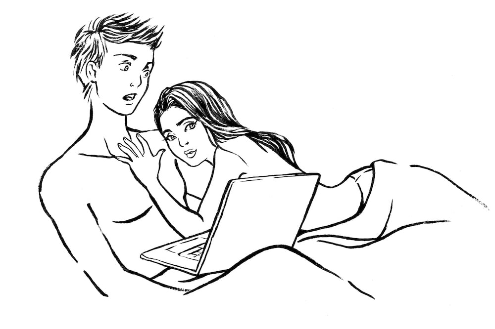 man and woman watching pornography together